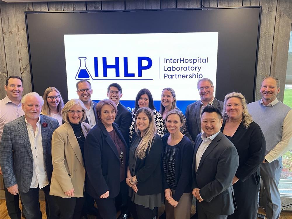 Group photo with IHLP logo in the background