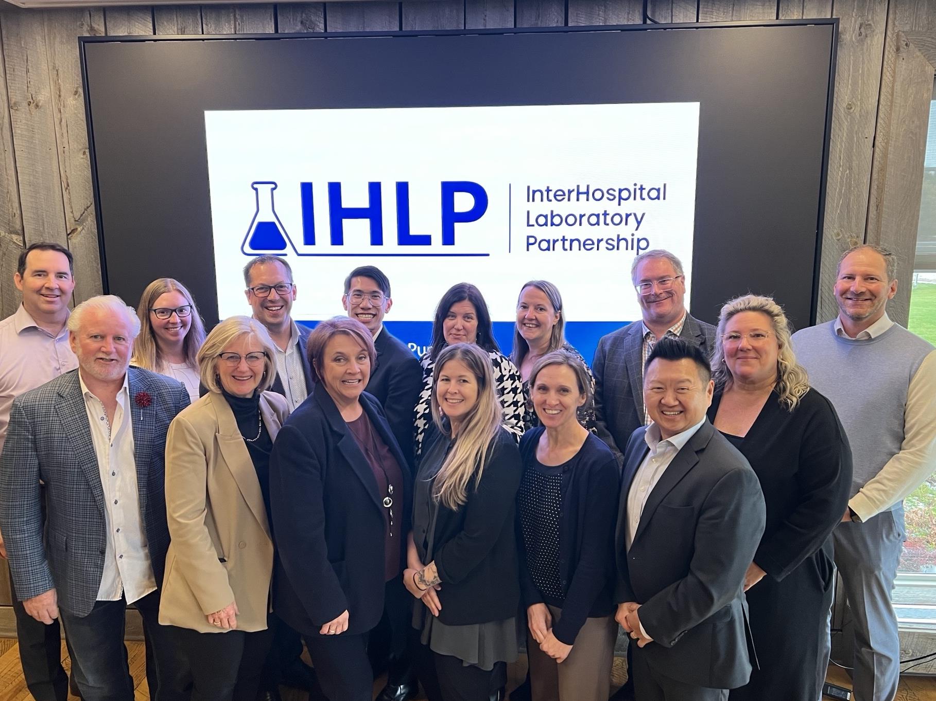 Group photo with IHLP logo in the background